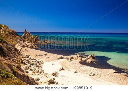Spiaggia Di Rena Maiori Beach With Azure Clear Water And Mountains, Sardinia