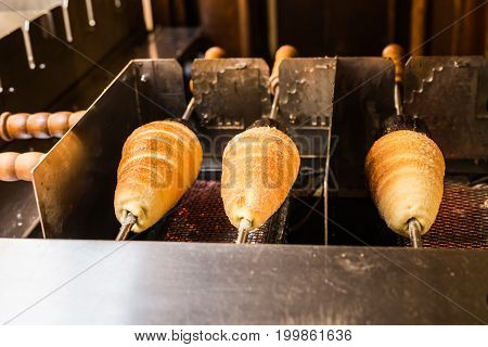 Trdelnik - traditional Czech hot sweet pastry sold in the streets of Prague