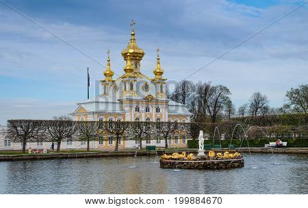 SAINT PETERSBURG RUSSIA - MAY 23 2017: Scenic view of the Grand Cascade The Peterhof Palace and Gardens complex is recognized as a UNESCO World Heritage Site