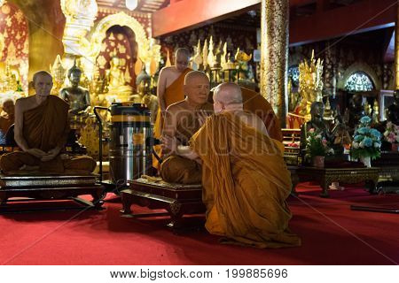 Buddhist Monk Clean And Remove Dust From Monk Waxwork Robe