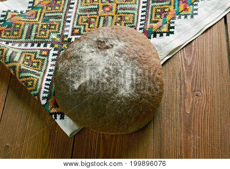 Russian traditional round bread - karavai  close up healthy meal