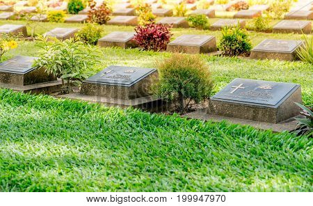 Kanchanaburi, Thailand - August 13, 2017 : Kanchanaburi War Cemetery In Thailand. The Cemetery Conta