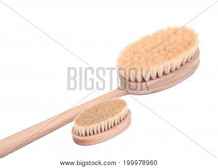 Natural tampico fiber body and face brushes isolated on white background