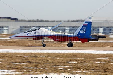 Zhukovsky, Moscow Region, Russia - March 2, 2014: Sukhoi Su-30M 597 WHITE of Flight Research Institute perfoming test flight at Zhukovsky.