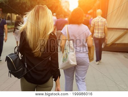 Beautiful woman on a busy street nice ass