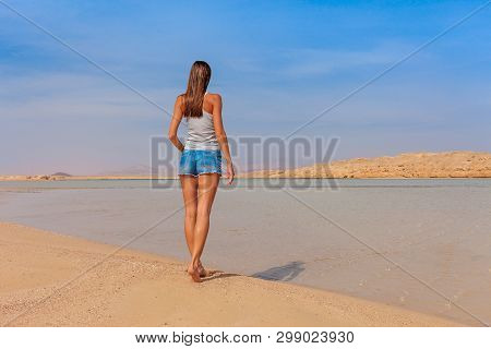 Tourist Woman At The Red Sea Coast In The Ras Mohammed National Park. Famous Travel Destionation In 