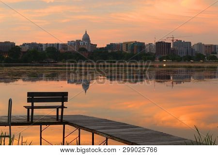 Madison Downtown Skyline With Wisconsin State Capitol Building Dome As Seen From Across Lake Monona 