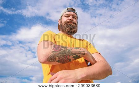 Lumbersexual Tattooed Well Groomed Hipster. Hipster With Mustache And Long Beard. Too Serious Right 