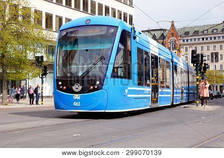 Stockholm, Sweden - April 30, 2019: One Blue Modern Articulated Tram Operates Line 7 At The Hamngata