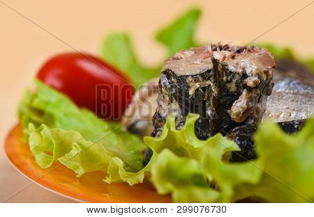 Macro Shot. Pieces Of Sardine Iwashi On Lettuce Leaves.