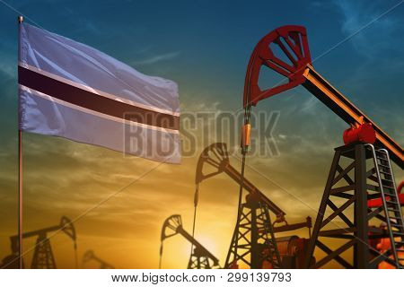 Botswana Oil Industry Concept, Industrial Illustration. Fluttering Botswana Flag And Oil Wells On Th