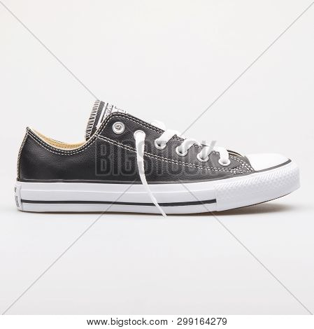 Vienna, Austria - August 23, 2017: Converse Chuck Taylor All Star Ox Leather Black Sneaker On White 