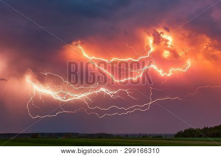 Close Up With Lightning With Dramatic Clouds Composite Image . Night Thunder-storm