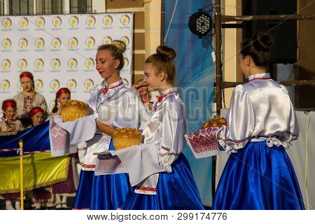 Girls In Ukrainian Traditional Clothing Prepare To Welcome Guests Of Festival
