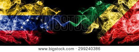 Venezuela Vs Congo, Congolese Smoky Mystic Flags Placed Side By Side. Thick Colored Silky Smoke Flag