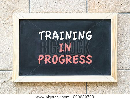 Training In Progres, Words On A Blackboard, A Business Or Human Resources Concept
