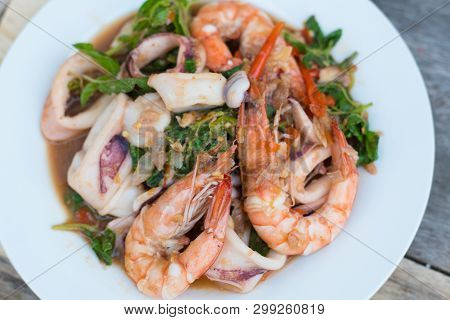 Thai Food; Stir Fired Seafood With Basil. Thai Famaous Traditional And Original Spicy Dish