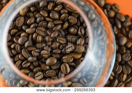 Close-up View Of Coffee Beans In A Glass . Horizontal Photography