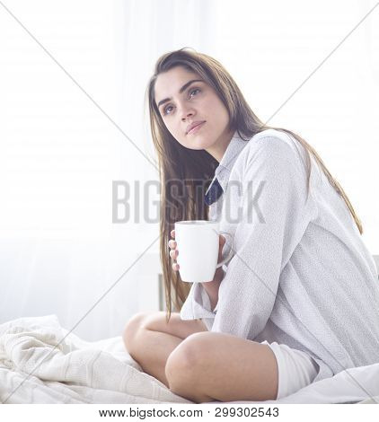 Young Beautiful Happy Brunette Woman In Black Silk Dressing Gow