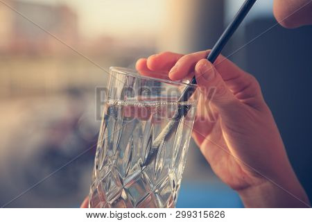 Refreshing Drink In The Summer: Girl Is Holding Glass With Cold Beverage