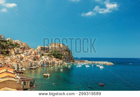 Scilla Castle Ruffo, And Harbor With Fishing Boats In Calabria, Southern Italy
