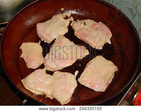Pork Meat Rolls With Breading Fried In A Pan