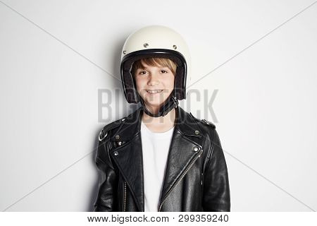 Portrait Of Young Happy Beautiful Teen Kid In Black Leather Jacket And White Moto Helmet Smiling On 