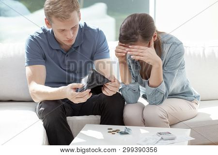 Stressed Married Couple Looking Frustrated, Having No Money To Pay Off Their Debts, Managing Family 