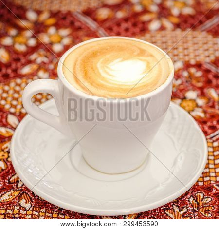 Arabic Coffee. Side View Latte Or Coffee Or Cappuccino.turkish Coffee On The Traditional Tablecloth.