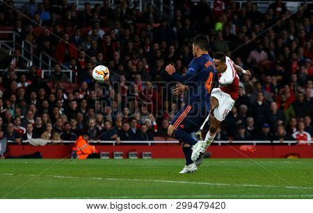 LONDON, ENGLAND - MAY 02 2019: Pierre-Emerick Aubameyang of Arsenal takes a shot at goal during the Europa League semi final leg one match between Arsenal and Valencia.