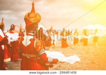 Photo Of Young Beautiful Women Wearing In Traditional National Mongolian Kalmykian Dresses In The Fe