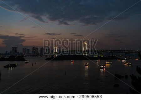 Buildings And Bridge In Tokyo City At Night.