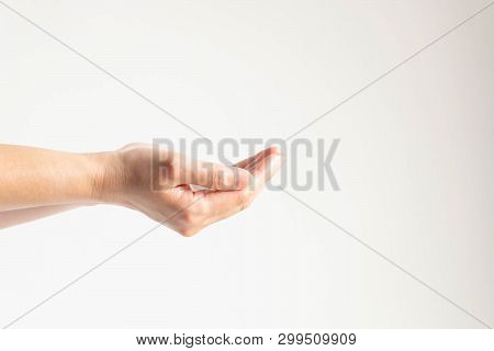 Side View Of The Palm Of Two Hands Close Together With A Copy Space On A White Background; Gesturing