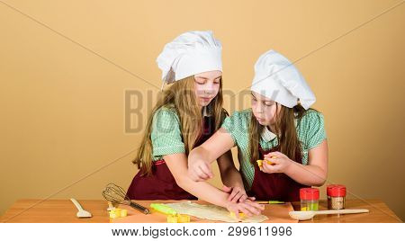 They Like Cooking. Adorable Little Girls Enjoy Cooking Together. Small Children Taking Cooking Class