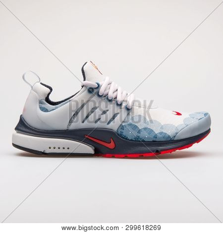 Vienna, Austria - August 28, 2017: Nike Air Presto Gpx Grey, Blue And Red Sneaker On White Backgroun
