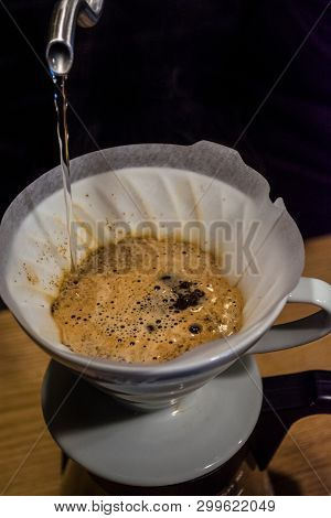 Preparation Process An Alternative Method Of Coffee In Cafe. Pour Over V60. Funnel And Server. Work 