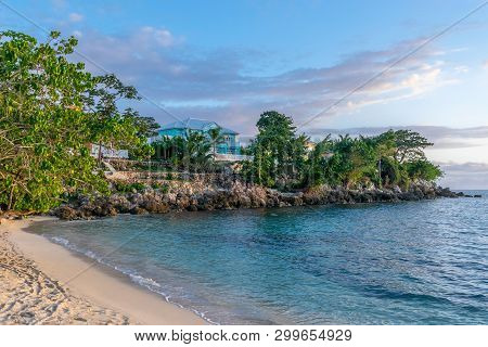 Beautiful White Sand Beach On Upscale Modern Residential Neighborhood Property With Colorful Houses/