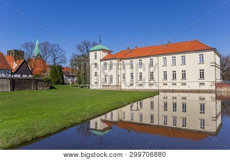 Castle Westerholt With Reflection In The Water In Germany