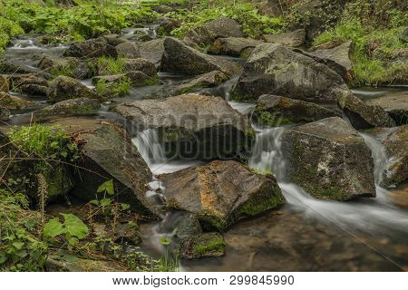 Spring Small River Olesnice Near Zlate Hory Town With Color Stone