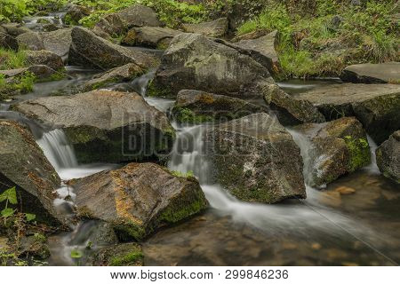 Spring Small River Olesnice Near Zlate Hory Town With Color Stone