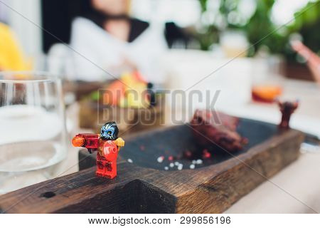 Ufa, Russia - April 11, 2019: Close Up Image Of Lego Minifigures Posing As Tradespeople Against A Fo