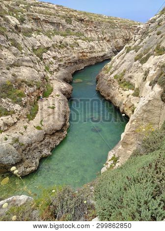 Wied Il-ghasri Lagoon Narrow Bay On Gozo Malta With Crystal Blue Turquoise Water