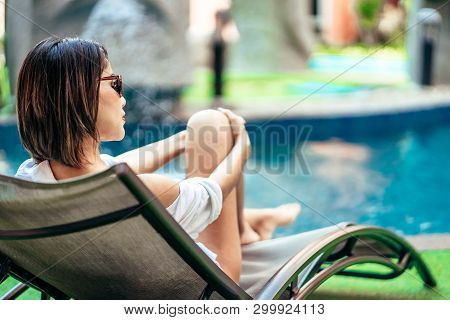 A Beauty Asian Woman Enjoying With Her Summer Vacation At Swimming Pool In Pattaya, Thailand.