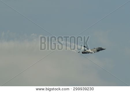 A Fighter Aircraft Flying For Display