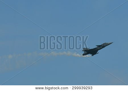 A Fighter Aircraft Flying For Display