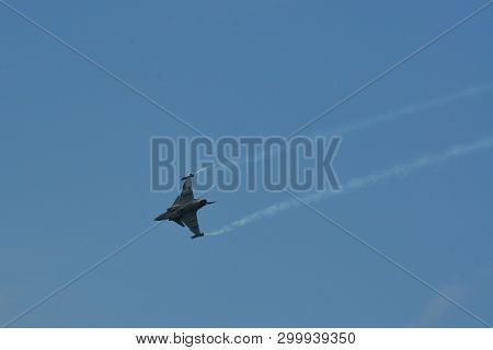A Fighter Aircraft Flying For Display