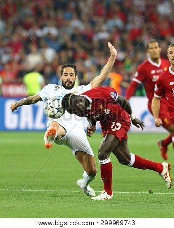 Kyiv, Ukraine - May 26, 2018: Sadio Mane Of Liverpool Is Kicked By Isco Of Real Madrid During Their 