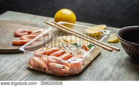 Appetizing And Delicious Ready Made Dish Of Shrimps And Rice In A Plastic Container. Concept Of Froz