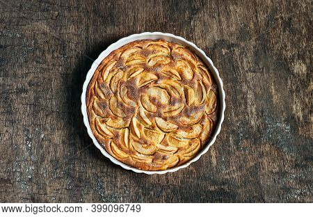 Traditional French Apple Pie On An Wooden Background