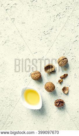 A White Bowl With Walnut Oil